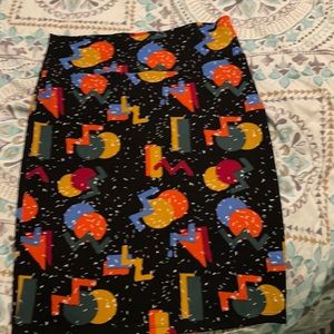 LulaRoe black with multi colored geometric patterned midi pencil skirt XL
